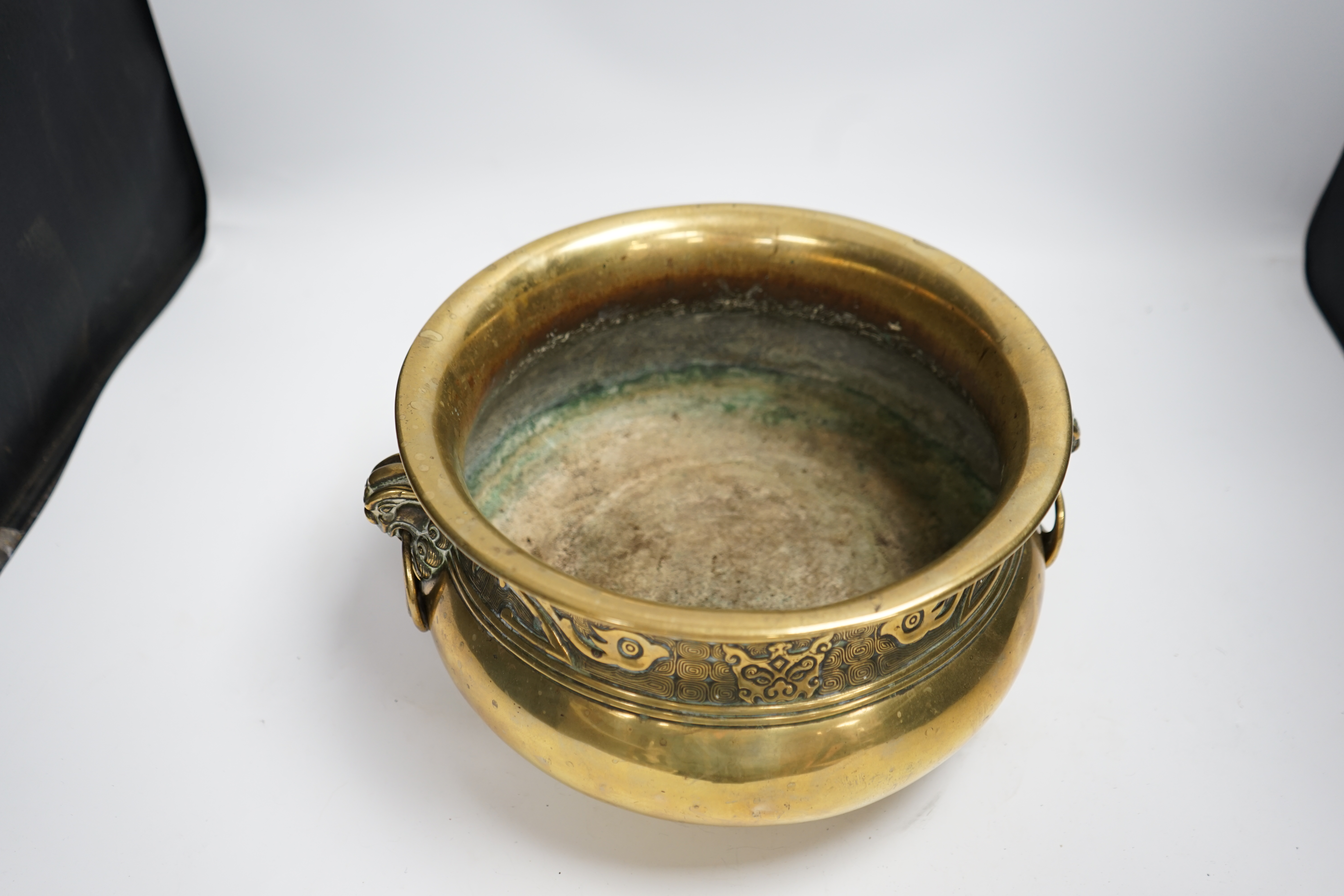 A large Chinese bronze censer, Xuande mark to base, 31cm across
